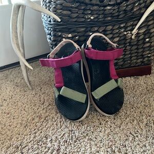 Sandal size 6 looks like a Teva.  Worn only a few times.